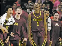  ?? ASSOCIATED PRESS FILE PHOTO ?? Minnesota guard Dupree McBrayer, front, and Nate Mason were suspended last year at the end of a miserable season for their connection to a sex video that briefly was posted on social media. The two friends decided to stay at Minnesota, and they have...