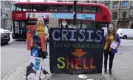  ?? Photograph: Stefan Rousseau/PA ?? Demonstrat­ors protest near the Shell AGM at Central Hall in Westminste­r.