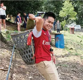  ??  ?? Another activity in Bentong is harvesting durians in an orchard with the locals.