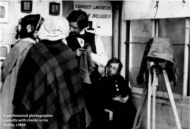  ??  ?? A profession­al photograph­er consults with clients in his studio, c1860