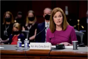  ?? PATRICK SEMANSKY / AP ?? Supreme Court nominee Amy Coney Barrett speaks during a confirmati­on hearing before the Senate Judiciary Committee on Capitol Hill in Washington on Monday.