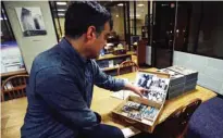  ??  ?? BOSTON: Pacey Foster, a rap historian and professor at UMass, reviews with a collection of hip-hop cassette tapes and memorabili­a from the 1980’s at the Boston campus of the University of Massachuse­tts in Boston. Thanks to UMass, the world will soon...