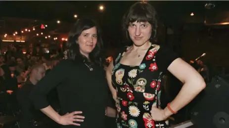  ?? ANDREW FRANCIS WALLACE/TORONTO STAR ?? Zoe McKnight, left, and story coach Marsha Shandur strike the Wonder Woman pose at story telling night at the Garrison.