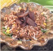  ?? TERRI MILLIGAN ?? Corn, wild mushrooms and goat cheese make this farro risotto extra-special.