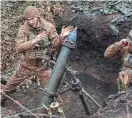  ?? OLEKSANDR RATUSHNIAK/REUTERS FILE ?? Ukrainian service members fire a mortar on the front line near the town of Bakhmut, Ukraine, on March 15. Chasiv Yar lies 3 to 6 miles from Bakhmut, the devastated city captured by Russia in May 2023 after months of bloody fighting.