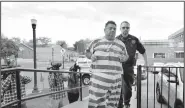  ?? File Photo/NWA Democrat-Gazette/BEN GOFF ?? Benton County Sheriff’s Deputies escort Mauricio Torres into the Benton County Courthouse Annex in Bentonvill­e for an arraignmen­t hearing May 4 before Circuit Judge Brad Karren. Terri Chambers, one of his attorneys, told Karren on Friday she may file a...