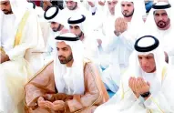  ?? Wam photos ?? Sheikh Saud bin Saqr Al Qasimi offers Eid prayers at the Grand Musallah in Ras Al Khaimah. —
