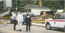  ?? MATT SMITH ?? An explosion at a Clarence Avenue home early Saturday morning drew emergency crews and curious neighbours.