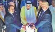  ?? TWITTER ?? A picture of US President Donald Trump (right), Saudi Arabia’s King Salman (centre) and Egyptian President Abdel Fattah alSissi with their hands on a glowing orb at a summit in Riyadh went viral on Monday as it prompted comparison­s between the Trump...