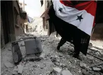  ?? PICTURE: REUTERS ?? Soldiers loyal to Syrian President Bashar al-Assad’s forces are deployed in the Qadam area near the Yarmouk Palestinia­n camp in Damascus on April 29.