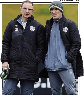  ?? ACTION IMAGES ?? Talking tactics: O’Neill and his assistant Roy Keane (right) yesterday