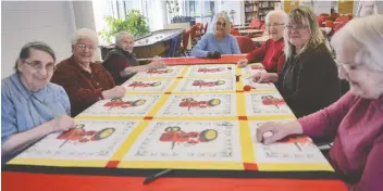  ?? [ALI WILSON / THE OBSERVER] ?? The group doing some quilting this week included, starting bottom left, Marjorie Roth, Theresa Cassel, Gwen Stanners, Mary Jordan, Ida Brubacher, Ruth Ann McCready and Eileen Heinz.