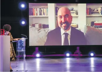  ?? THE ASSOCIATED PRESS ?? Douglas Stuart speaks onscreen at The 2020 Booker Prize Awards Ceremony at the Roundhouse in London.