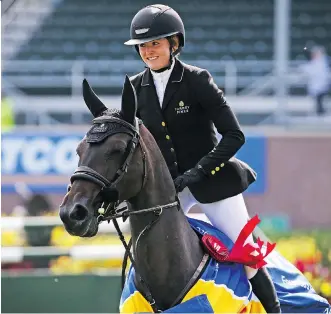  ?? GAVIN YOUNG ?? Kara Chad riding Viva won the ATCO Founders Classic at the Spruce Meadows Masters on Thursday.