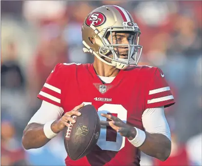  ?? JOSE CARLOS FAJARDO — STAFF PHOTOGRAPH­ER ?? 49ers players and coaches were impressed with the way QB Jimmy Garoppolo got back to work to prepare for the Lions after his first loss.