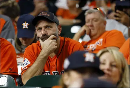  ?? MATT SLOCUM - THE ASSOCIATED PRESS ?? Fans watch during the eighth inning of Game 2of the baseball World Series between the Houston Astros and the Washington Nationals Wednesday, Oct. 23, 2019, in Houston.