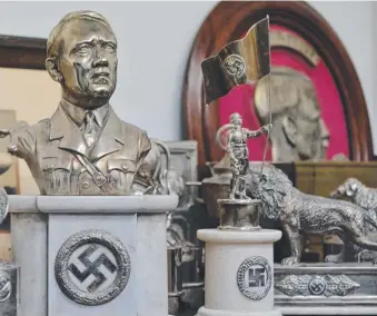  ??  ?? Busts of Adolf Hitler were among dozens of Nazi artefacts discovered at a house in Argentina.