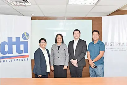  ?? PHOTOGRAPH COURTESY OF DTI ?? FINANCIAL inclusion deal was sealed among (second, from left) DTI-Regional Operations Group Undersecre­tary Blesila Lantayona beside her, DTI-BSMED OIC-Director Emma C. Asusano, posing with Justpayto Co-founder and Managing Director, Mr. John R. Castro, (2nd from right) and Founder Mr. JP Tamayo, during the courtesy visit last December 2022 at the DTI office in Makati City.