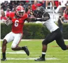  ?? JOHN KELLEY/GEORGIA PHOTO ?? After going without a catch until the fourth game of the season, Georgia junior Javon Wims has led the Bulldogs in their last three contests with 132 receiving yards.