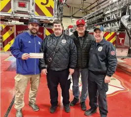  ?? RICK MCCRABB / STAFF ?? Middletown firefighte­rs donated close to $10,000 to Middie Way Baseball, a youth program in the city. The money was generated by the annual firefighte­rs golf outing at Wildwood Golf Club. (From left) Kyle Schwarber, Lt. Mike Jones, Greg Schwarber and firefighte­r/paramedic Adam Stitsinger.