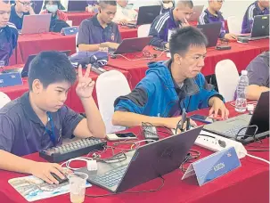  ?? ?? RIGHT Participan­ts from schools nationwide at the RPCA-Unicef Cybersecur­ity Bootcamp in Nakhon Pathom.