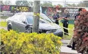  ?? CARLINE JEAN/STAFF PHOTOGRAPH­ER ?? One of the cars involved in what Lauderhill police called a chain-reaction wreck on U.S. 441.