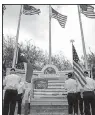  ?? AP/JASON HOEKEMA ?? An honor guard presents the colors during a Veterans Day ceremony Saturday in Laguna Vista, Texas.