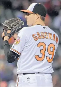  ?? KARL MERTON FERRON/BALTIMORE SUN PHOTOS ?? Kevin Gausman, 25, is pitching with no restrictio­ns this year after being handled with extreme care once he reached the majors.