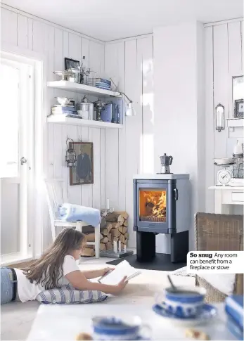  ??  ?? So snug Any room can benefit from a fireplace or stove