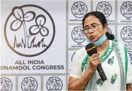  ?? — PTI ?? West Bengal chief minister Mamata Banerjee addresses a press conference at Kalighat in Kolkata on Friday.