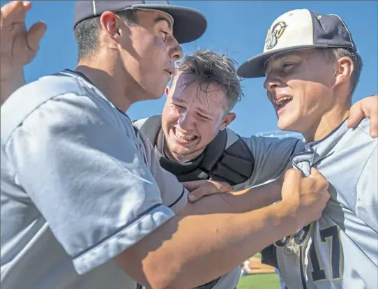  ?? Steph Chambers/Post-Gazette ?? Ringgold’s Chase Angotti, Robert Boyer and Koby Bubash celebrate their win against Valley View in the PIAA Class 4A baseball championsh­ip game Thursday at Medlar Field at Lubrano Park in University Park, Pa.