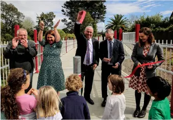  ??  ?? Above: Councillor Ross Clow, Albert-Eden Local Board Member Margi Watson, Deputy Mayor Bill Cashmore, NZTA’s Pete Clarke and Auckland Transport’s Kathryn King.