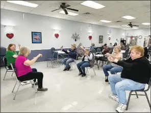  ?? (NWA Democrat-Gazette/Lynn Kutter) ?? Lincoln Senior Center has a chair exercise class at 10:45 a.m. Wednesdays and Fridays. Lynette Ellis and Pam Moore were leading the class. Other scheduled events include live music, bingo games and gospel singing.