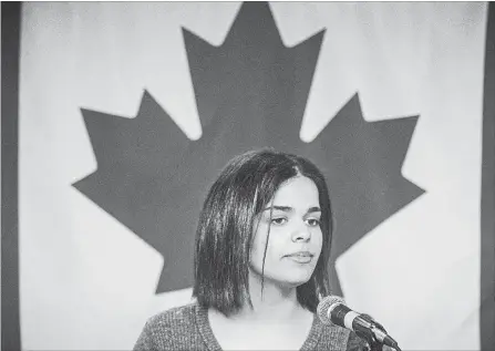  ?? TIJANA MARTIN THE CANADIAN PRESS ?? Rahaf Mohammed, 18, of Saudi Arabia, makes a public statement at the COSTI Corvetti Education Centre in Toronto on Tuesday.