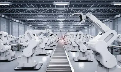  ?? Photograph: Kittipong Jirasukhan­ont/Alamy Stock Photo ?? The pace of automation will quicken as firms guard against supply shocks, putting more downward pressure on wages.