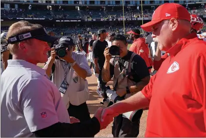  ?? THEARON W. HENDERSON — GETTY IMAGES, FILE ?? Raiders coach Jon Gruden shakes hands with Chiefs coach Andy Reid after the Chiefs defeated the Raiders in September 2019 in Oakland.