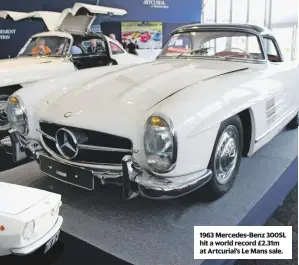  ??  ?? 1963 Mercedes-Benz 300SL hit a world record £2.31m at Artcurial’s Le Mans sale.