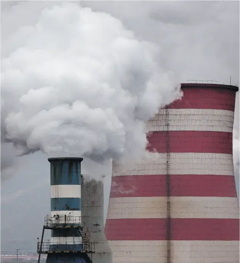  ?? KEVIN FRAYER / GETTY IMAGES FILES ?? A coal-fired plant in China. The creation of natural gas infrastruc­ture in China hasn’t kept up with the government’s push to tackle pollution, leading to the heating disruption­s, a particular problem for the north of the country.