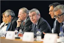  ?? Patrick Semansky / Associated Press ?? Internatio­nal Olympic Committee President Thomas Bach (center) leads the 132nd IOC session prior to the 2018 Games.