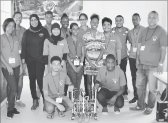  ??  ?? Team Guyana posing with their robot entry for the recent Washington DC robotics tournament