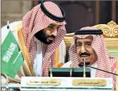  ?? SAUDI PRESS AGENCY ?? Among the changes by King Salman, right, is an overhaul of a panel led by Prince Mohammed bin Salman, left.