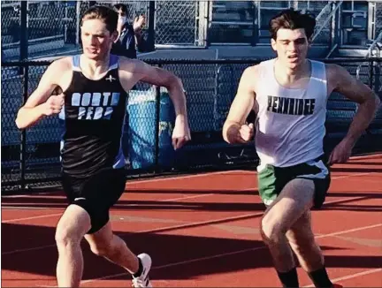  ?? KEV HUNTER — MEDIANEWS GROUP ?? North Penn’s Gavin Zanck holds on to beat Pennridge’s Diego Lera-Lozano in the 800.