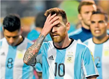  ?? AFP ?? Lionel Messi of Argentina gestures as he walks off the ground at the end of the goalless World Cup qualifier football match against Peru in Buenos Aires, Argentina. —