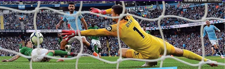  ?? GETTY IMAGES ?? Lethal touch: Aguero nets to seal City’s win