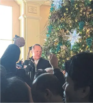  ?? BEN WALKER THE ASSOCIATED PRESS ?? Agent Scott Boras gives a theatrical news conference every year at the baseball winter meetings. This year he held court beside a giant Christmas tree in the lobby of Mandalay Bay in Las Vegas.