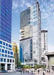  ??  ?? From City-Builder: The Architectu­re of James K.M. Cheng, this photo shows Cheng’s Fairmont Pacific Rim and peekaboo Shaw Tower.