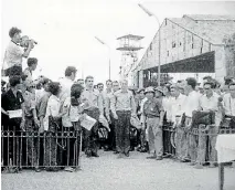  ??  ?? John McCain, centre right, leads a column of Americans released from a POW camp on March 14, 1973 In Hanoi.