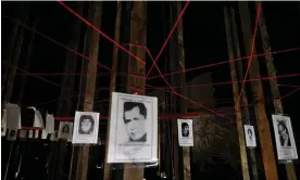  ?? 16 August. Photograph: Iván Alvarado/Reuters ?? Tributes, reading ‘Truth and Justice’, to the victims of Pinochet dictatorsh­ip in Santiago,