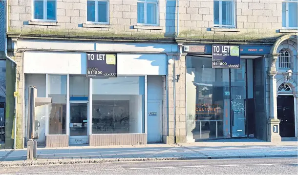  ?? Photograph by Scott Baxter ?? WEST END: The former Thomas Cook shop, left, could become a gastropub while the site next door is in line to be transforme­d into a restaurant.