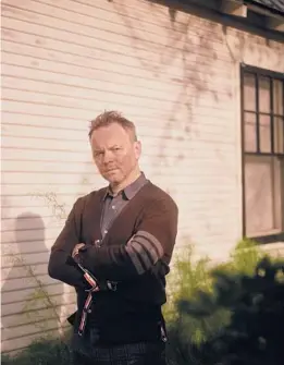  ?? LAUREN WITHROW/THE NEW YORK TIMES ?? Noah Hawley, seen Dec. 9 at his Austin, Texas, home, has released his sixth novel, “Anthem,” set in a divided America with a touch of magical realism.